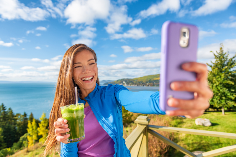 Young Woman Taking A Selfie For Social Media In A Healthy Environment